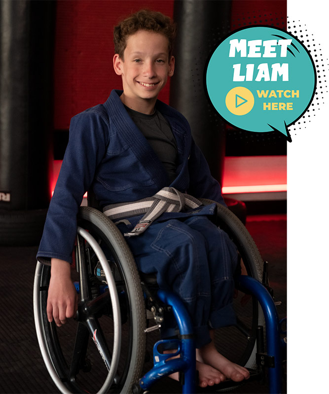 Patient in martial arts uniform in a wheelchair; Meet Liam; Watch Video