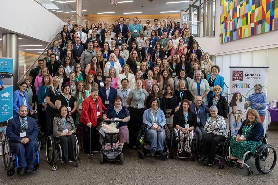 large group of spina bifida meeting participants